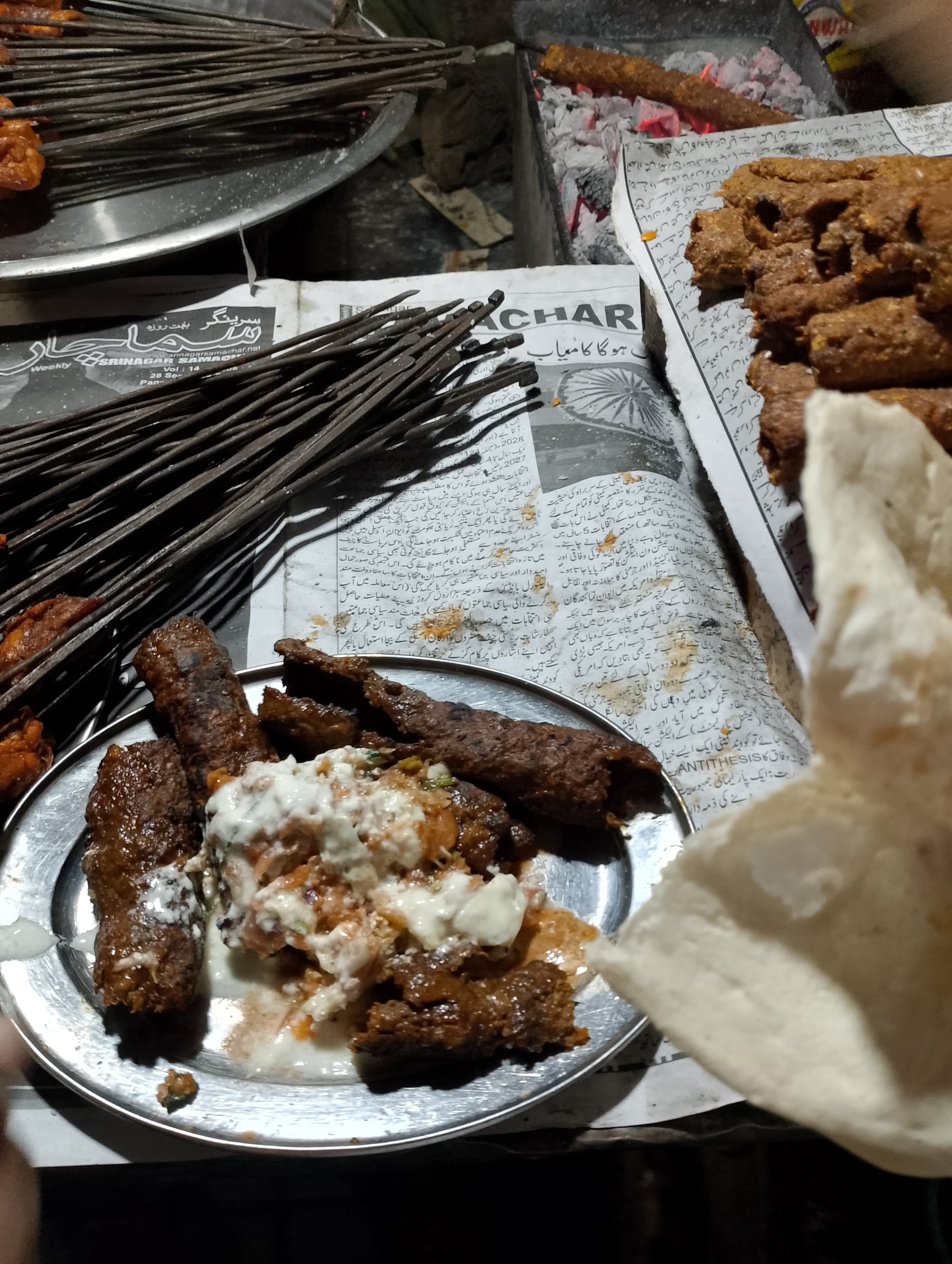 Trying the mutton kebabs from a roadside shack shop